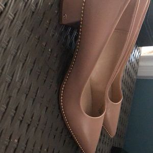 Coach leather pumps.